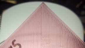 The corners are closed in nicely, but you can see where the 925 side has started to interfere with itself, creating tiiiiiny little ridges. You can also see the inconsistent filament pattern towards the middle.
